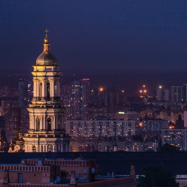 white and green tower during night time